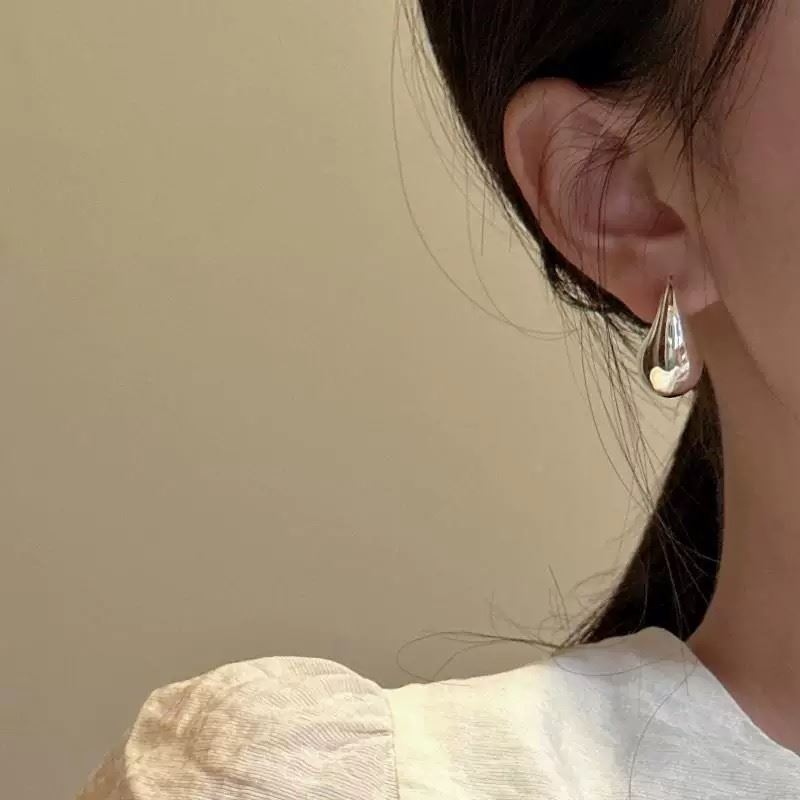 T*f*ny earrings